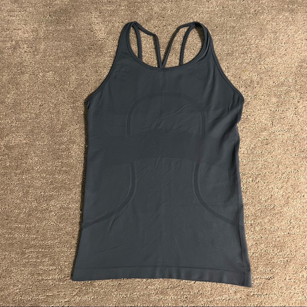 High neck, strappy back, swiftly tank